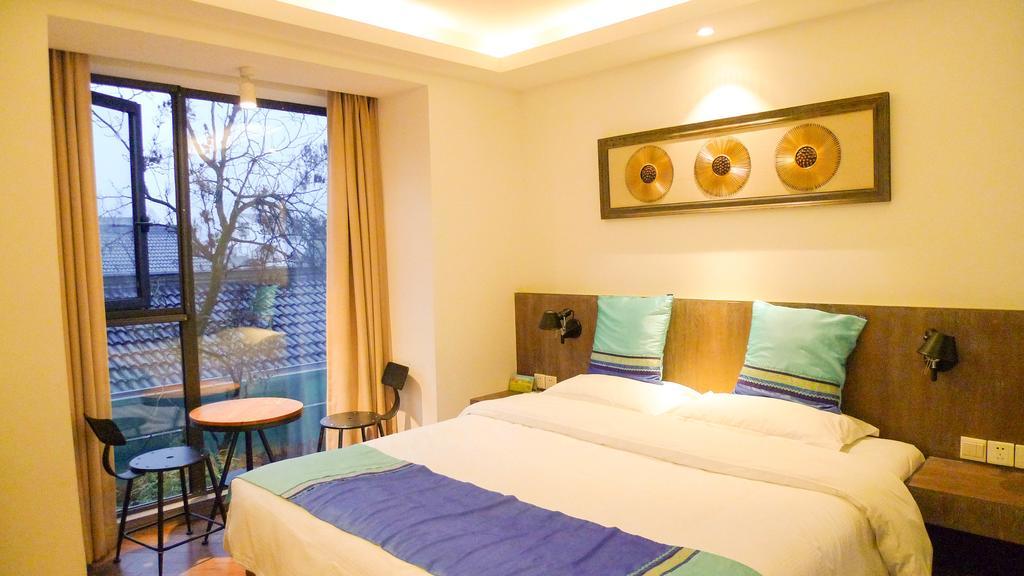 Two Towns Hostel Hangzhou Rum bild