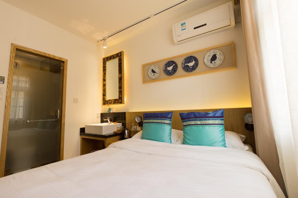 Two Towns Hostel Hangzhou Rum bild